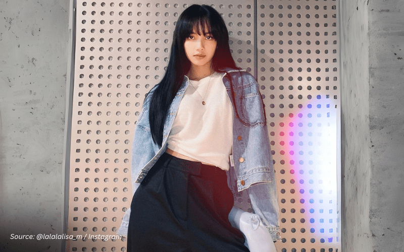 An image of Lisa wearing a denim jacket