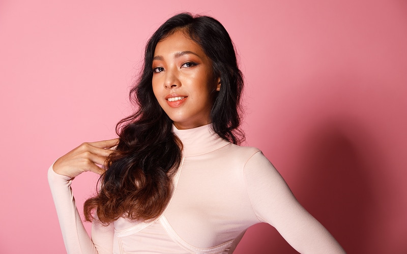 Image of a person with styled curly hair