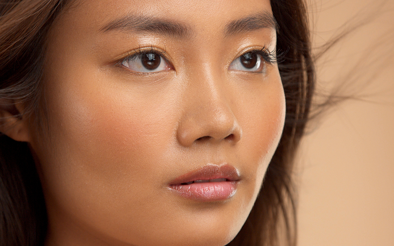 A stock photo of a model wearing a soft natural eye look.