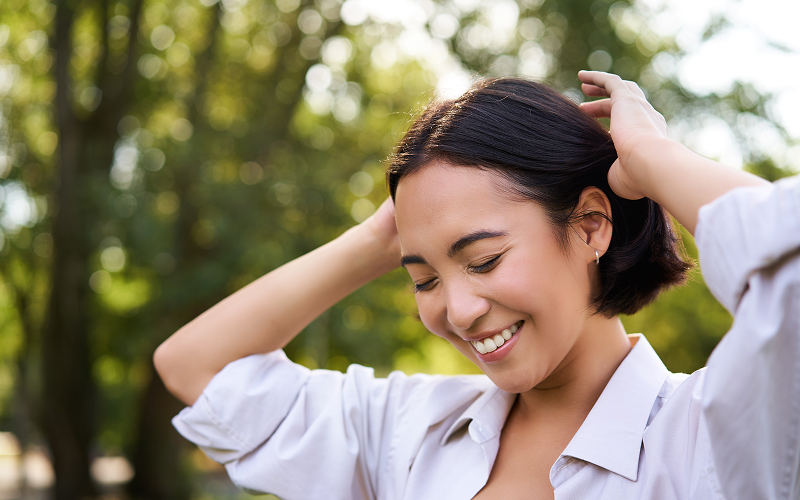 A stock photo of a model with healthy, soothed scalp.