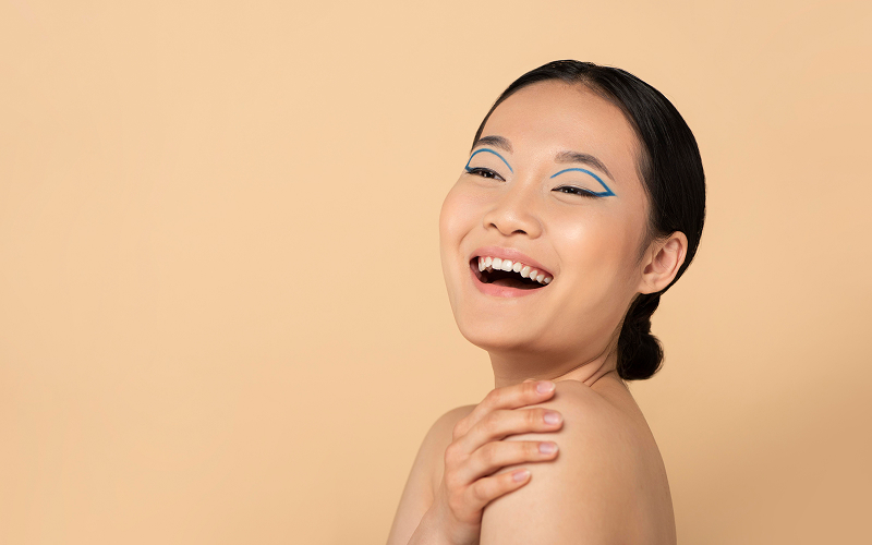 A stock photo of a model with visibly glowing skin.