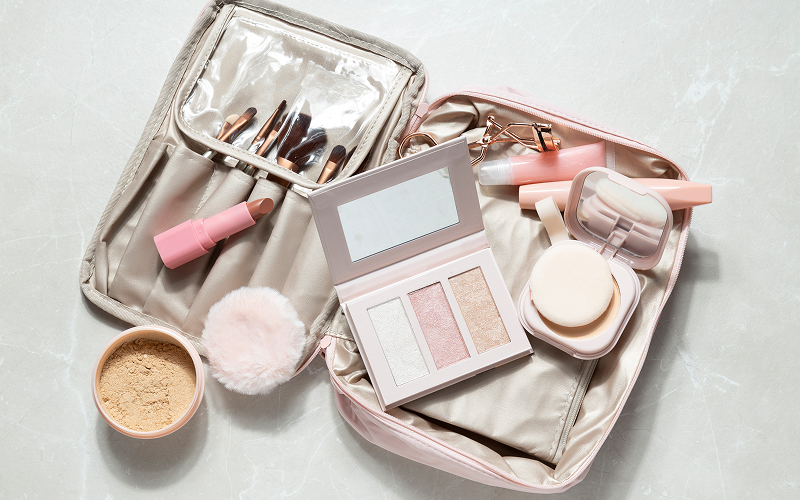 A stock photo of a travel-friendly palette inside a handbag.